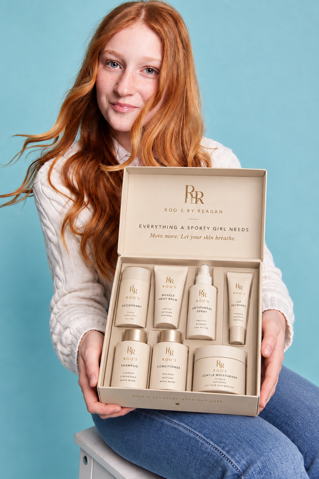 Reagan holding the Roo's by Reagan sports recovery collection